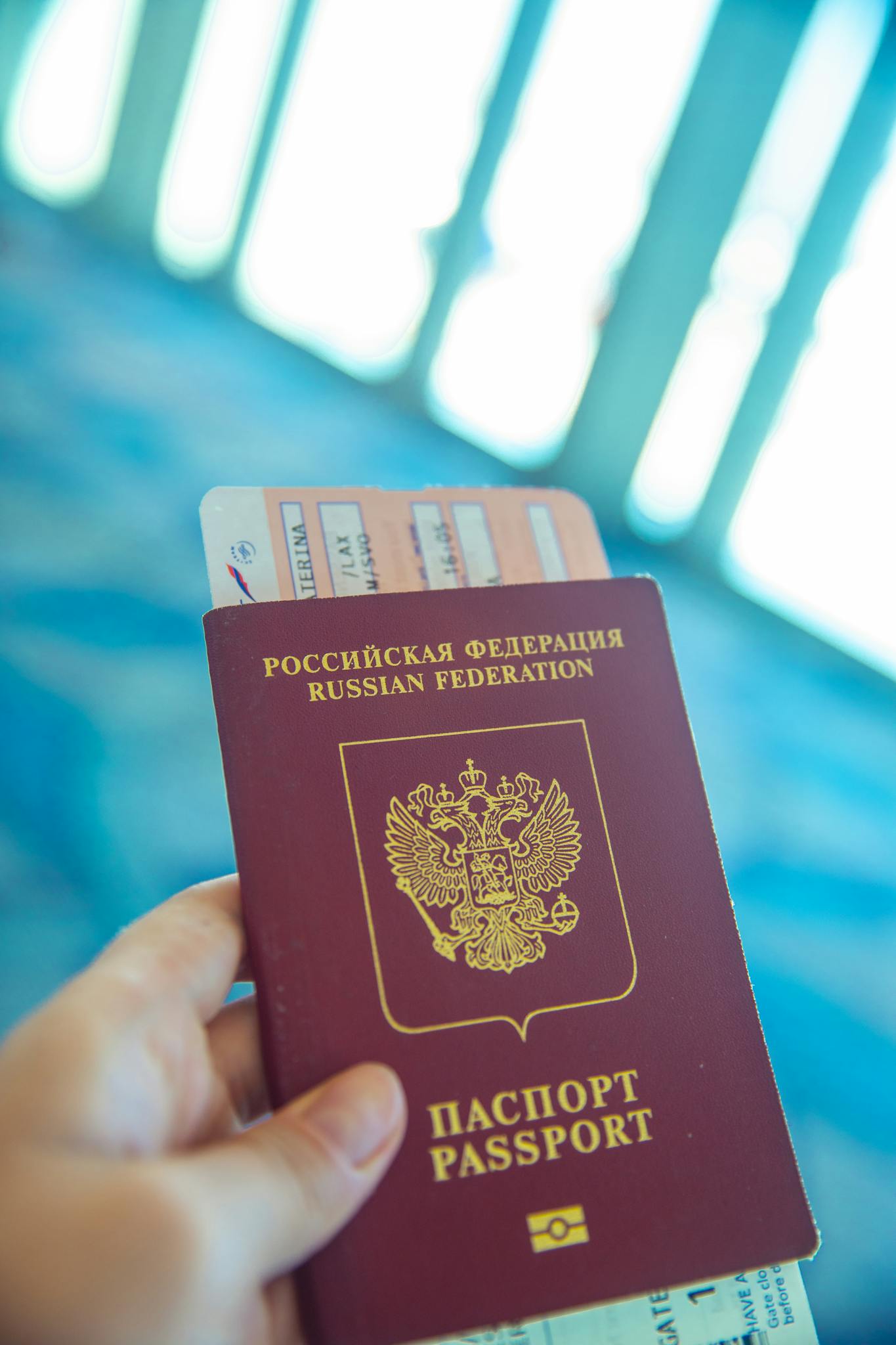 Person Holding a Passport 